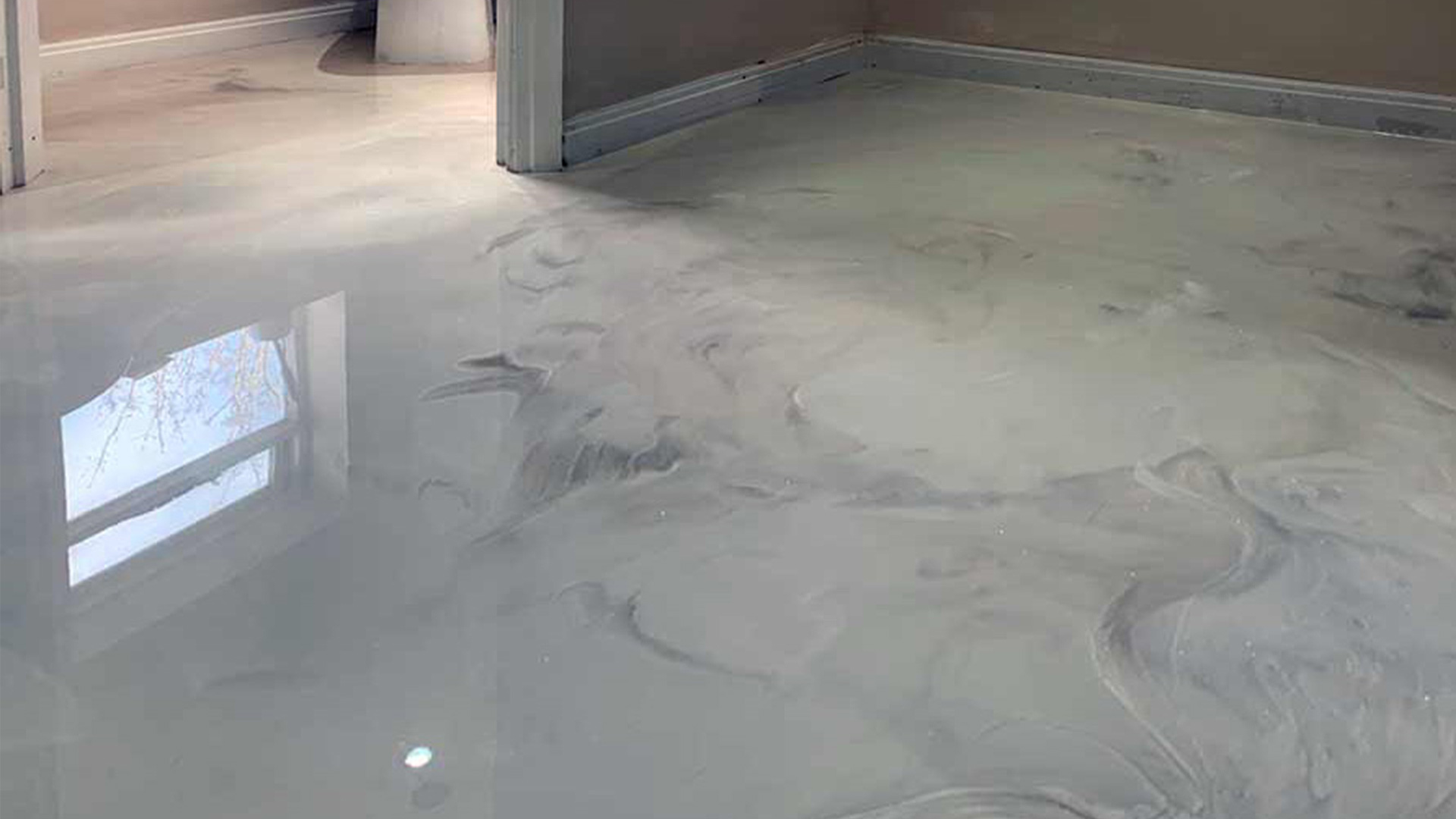 Metallic Epoxy Resin Flooring - Stunning, custom metallic resin floors that create a unique, high-end look for homes and showrooms.